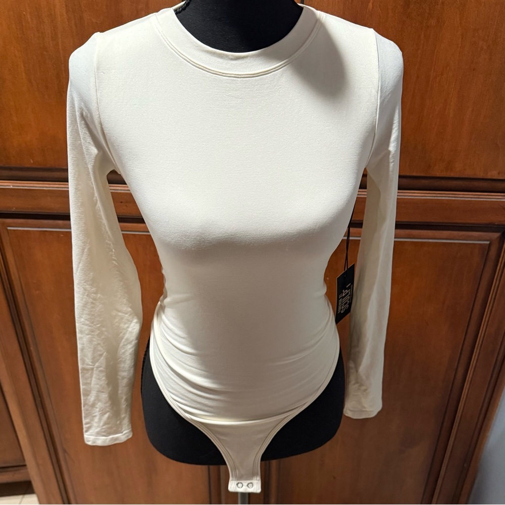 Forever 21 Cream Long Sleeve Bodysuit